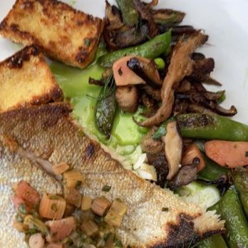 Bouquet Restaurant - Off the Hook: mushrooms, snap peas, Radish Dylan watercress green scallions and rhubarb relish with Rainbow Trout (tofu) atop - Bars Near Me - Covington, Kentucky