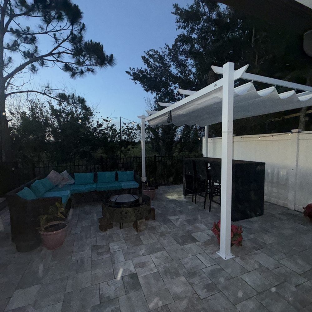 Golden Hands Handymans - Lshaped sofa, fire pit, pergola covering 6 seater high top on pavers. - Handyman Near Me - Windermere, Florida Golden Hands Handymans - Lshaped sofa, fire pit, pergola covering 6 seater high top on pavers. - Handyman Near Me - Windermere, Florida