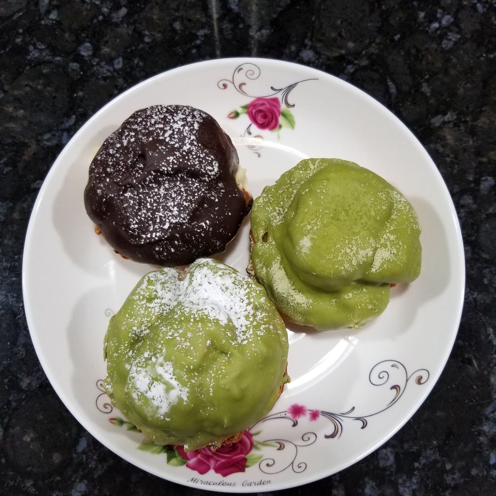 Beard Papa's - Chocolate puff with vanilla cream, green tea puff with green tea cream, and green tea puff with vanilla cream - Desserts Near Me - Flushing, New York Beard Papa's - Chocolate puff with vanilla cream, green tea puff with green tea cream, and green tea puff with vanilla cream - Desserts Near Me - Flushing, New York