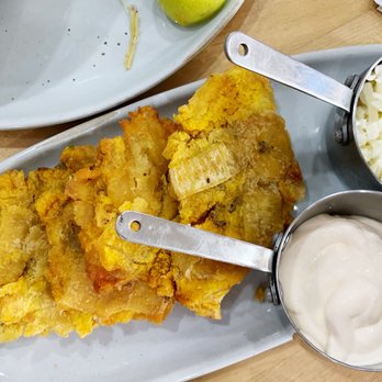 Saman - a plate of food and a bowl of yogurt - Venezuelan Near Me - Doral, Florida Saman - a plate of food and a bowl of yogurt - Venezuelan Near Me - Doral, Florida