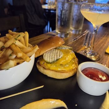 The Pop Spot Bar and Grill - Smash burger on a potato bun with fries - Salad Near Me - Memphis, Tennessee The Pop Spot Bar and Grill - Smash burger on a potato bun with fries - Salad Near Me - Memphis, Tennessee