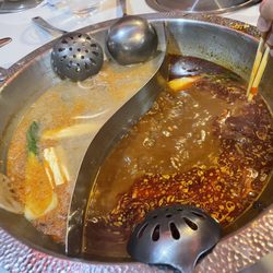 Strongly recommend the ying yang style pot. We Chongching spicy broth and herbal ginseng chicken broth as our bases. Both very good.