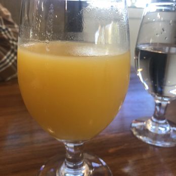 Heirloom Kitchen - Glass of oj & pineapple juice yum - Burgers Near Me - Stockton, California