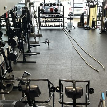 SWEAT - Functional area downstairs. Rogue Rhino belt squat, rogue power rack, smith machine, dumbbell's and a cable weight stack. - Gyms Near Me - Dallas, Texas