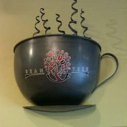 Bean Tree Cafe - Really cool logo on iron wall decoration