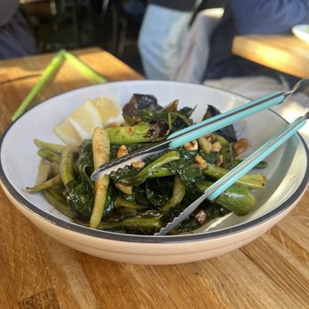 Mott St - Wok-Smoked Gai Lan- made vegan without the oyster sauce! Light and flavorful. - Asian Fusion Near Me - Chicago, Illinois Mott St - Wok-Smoked Gai Lan- made vegan without the oyster sauce! Light and flavorful. - Asian Fusion Near Me - Chicago, Illinois