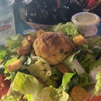 Fish Tales - Caesar salad with a crab cake - Bars Near Me - Ocean City, Maryland