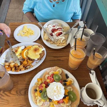 Eggs 'n Things - Sour Cream & Fresh Strawberry Crepes, crab cakes Crab Cake Benedict, Fresh Fruit Rainbow Pancakes.... Round table of POG juice - Breakfast & Brunch Near Me - Honolulu, Hawaii Eggs 'n Things - Sour Cream & Fresh Strawberry Crepes, crab cakes Crab Cake Benedict, Fresh Fruit Rainbow Pancakes.... Round table of POG juice - Breakfast & Brunch Near Me - Honolulu, Hawaii