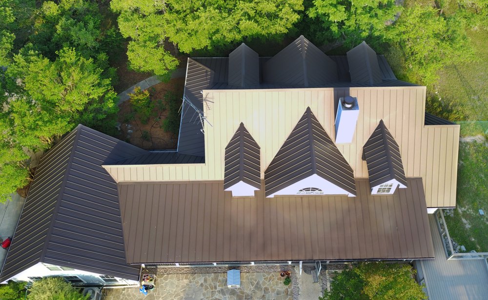 Slide of Green Knight Metal Roofing