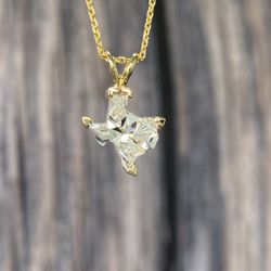 The Diamond Rooms - Texas Cut diamond set in a yellow gold pendant with a matching chain.