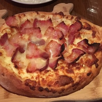 Cheeseboat - Bacon Cheeseboat ($19) - check out the neat little piggy plate it comes on xD - Georgian Near Me - Brooklyn, New York