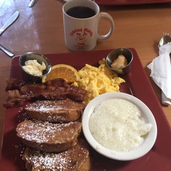 Toasted Mango Cafe - Toasted Mango Special with grits and gluten free French toast - Cafes Near Me - Sarasota, Florida