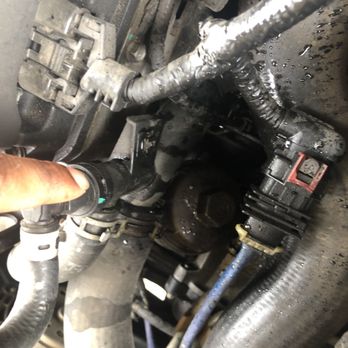 Take 5 Oil Change - coolant leak from tech trying to remove oil filter and cracking coolant housing - Oil Change Stations Near Me - Cypress, Texas Take 5 Oil Change - coolant leak from tech trying to remove oil filter and cracking coolant housing - Oil Change Stations Near Me - Cypress, Texas