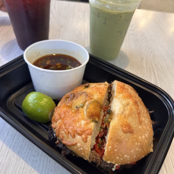 Rise Bagels - Birria with jalapeno cheddar bagel, broth on the side Strawberry matcha and refresher - Bagels Near Me - Irvine, California Rise Bagels - Birria with jalapeno cheddar bagel, broth on the side Strawberry matcha and refresher - Bagels Near Me - Irvine, California