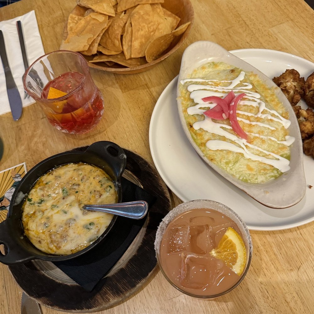 Santeria - Enchiladas verses, queso fundido, spirit of oaxaca, guava margarita - Mexican Near Me - San Francisco, California Santeria - Enchiladas verses, queso fundido, spirit of oaxaca, guava margarita - Mexican Near Me - San Francisco, California