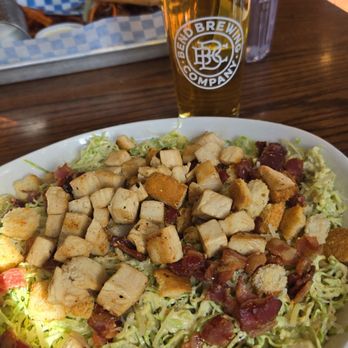 Bend Brewing Company - Huge brussels sprouts cesar salad with chicken. - Breweries Near Me - Bend, Oregon