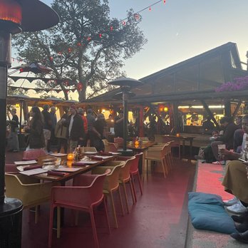 Nepenthe - Outdoor seating and warm waiting area - New American Near Me - Big Sur, California
