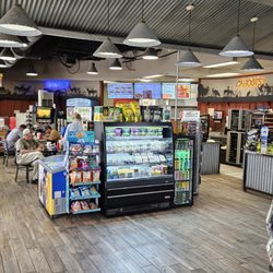Cahoots Cafe - Cahoots cafe with dine-in seating and Hunt Brothers Pizza made to order