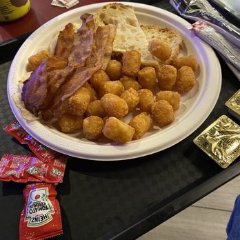 Backstage Deli - Classic breakfast. Two eggs over easy toast, and bacon. Paper plates and cutlery served cafeteria style. - Delis Near Me - Las Vegas, Nevada
