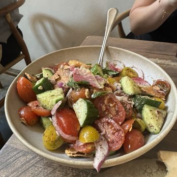 Delbar Middle Eastern - heirloom tomato salad (HUGE portion for $14) - Persian/Iranian Near Me - Atlanta, Georgia Delbar Middle Eastern - heirloom tomato salad (HUGE portion for $14) - Persian/Iranian Near Me - Atlanta, Georgia
