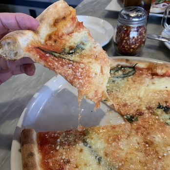 Pizzeria Bocce - Margherita pizza with fresh garlic added. - Pizza Near Me - Cottonwood, Arizona Pizzeria Bocce - Margherita pizza with fresh garlic added. - Pizza Near Me - Cottonwood, Arizona