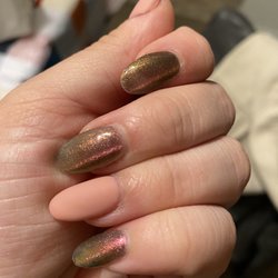 4 Seasons Nails Spa - Acrylic fill with cat eye polish and matte top coat on plain polish.