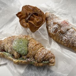 Pistachio and Strawberry croissant, Kouign Amman with Nutella, and Strawberry Croissant
