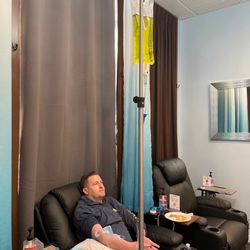 Dr. Revive IV Therapy & Pain Clinic - IV Therapy @ dr.revive  in private room  streaming your favorite shows on Netflix, YouTube, Hulu