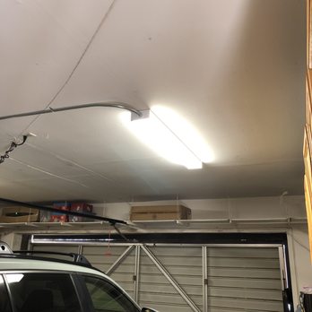Leon Electric - One of the two LED light fixtures installed in the garage - Electricians Near Me