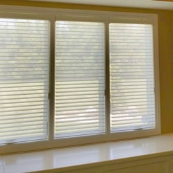 Bellagio Window Fashions - Window Shadings over commercial office windows.