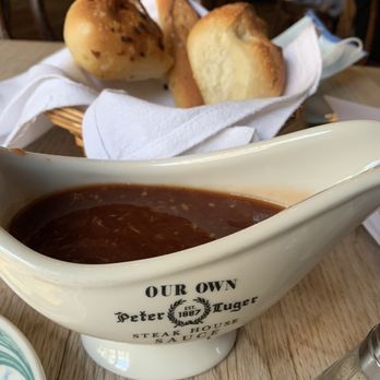 Peter Luger - Bread and dressing - tastes like a sweet cocktail sauce - Steakhouses Near Me - Brooklyn, New York