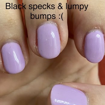 Ami's Nail Salon - My nails with the dust and black specks from the gel removal she did from my pinky nail trapped inside the clear coat of all the nails. - Nail Salons Near Me - Waipahu, Hawaii