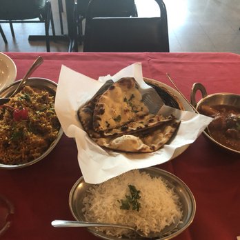 Manraj’s Kitchen - Chicken Biryani, Garlic Naan and Chicken Vindaloo. - Indian Near Me - Auburn, Washington Manraj’s Kitchen - Chicken Biryani, Garlic Naan and Chicken Vindaloo. - Indian Near Me - Auburn, Washington