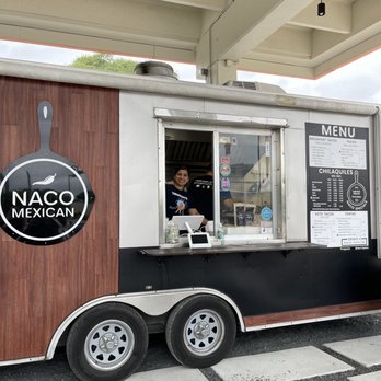 Naco Mexican Eatery - a man behind the window - Food Trucks Near Me - San Antonio, Texas