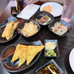 Sushi Boss - Crab Rangoon Shrimp tempura Kani salad Jalapeño yellowtail Black pepper tuna