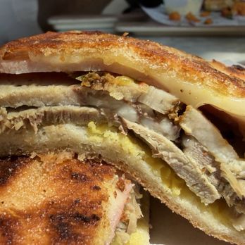 La Lima Sangucheria - Calle 8 closeup ham, toast pork, Swiss, a unique mustard and that amazing relish with extra on the side - Sandwiches Near Me - Charlotte, North Carolina La Lima Sangucheria - Calle 8 closeup ham, toast pork, Swiss, a unique mustard and that amazing relish with extra on the side - Sandwiches Near Me - Charlotte, North Carolina