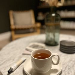 Sanctuary - At my favorite place with a warm cup of tea and my new tube of retinol!