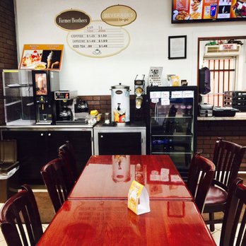 Tipton Burger - a table and chairs in a restaurant - Burgers Near Me - Tipton, Pennsylvania
