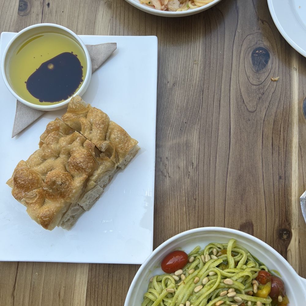 Oenotri - Vegan pesto pasta and shrimp pasta with focaccia and olive oil - Italian Near Me - Napa, California Oenotri - Vegan pesto pasta and shrimp pasta with focaccia and olive oil - Italian Near Me - Napa, California
