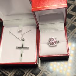 Herricks Jewelers - Gorgeous classic cross necklace and pink stone diamond around ring.