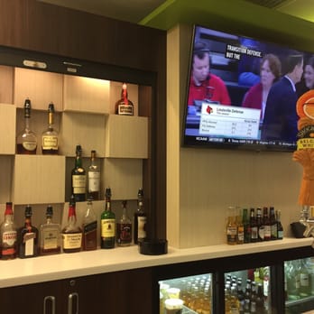Plane Bar - a television and liquor bottles - Airport Lounges Near Me - Fort Lauderdale, Florida Plane Bar - a television and liquor bottles - Airport Lounges Near Me - Fort Lauderdale, Florida