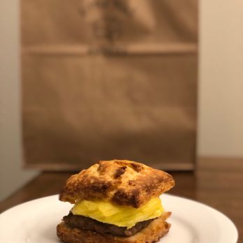 Little Ola's Biscuits - a breakfast sandwich on a plate - Salad Near Me - Austin, Texas Little Ola's Biscuits - a breakfast sandwich on a plate - Salad Near Me - Austin, Texas