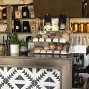 Photo of The Grounds Bean Bar - San Diego, CA, United States. Baked goods at the counter