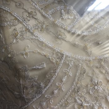 Memories Gown Preservation - Treated dress-small sequins are dull yellow and color is definitely changed! - Laundry Services Near Me - Houston, Texas