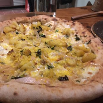 Houlme - Potato, pickled shallot, cured egg, smoked cheese pizza. Indescribable. - Pizza Near Me - Eastsound, Washington Houlme - Potato, pickled shallot, cured egg, smoked cheese pizza. Indescribable. - Pizza Near Me - Eastsound, Washington