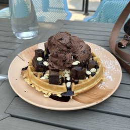 a waffle with ice cream and chocolate a waffle with ice cream and chocolate