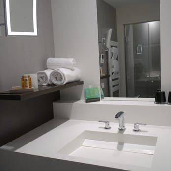 Hôtel D - Sink and shower area. Toilet is in a separate room in the room - Hotels Near Me - Strasbourg, 67