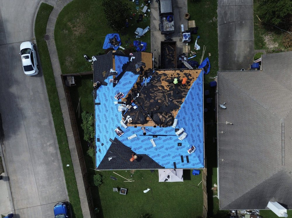 Slide of Noble Roofing