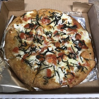 The Root Cafe - $12.00 The Freshy Pizza -  fresh garlic & olive oil with fresh red bell peppers, provolone & fresh mozzarella topped with fresh basil. - Coffee & Tea Near Me - Lakewood, Ohio