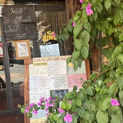 Gino Cacino di Angelo - The entrance hidden by masses of bougainvillea - go ahead, step inside for the magic!